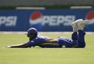 PORT OF SPAIN, TRINIDAD AND TOBAGO - MARCH 23:  Muttiah Muralitharan of Sri Lanka shows his relief after catching Surav Ganguly of India during the ICC Cricket World Cup 2007 Group B match between India and Sri lanka at the Queens Park Oval Cricket Ground on March 23, 2007 in Port of Spain, Trinidad.   (Photo by Clive Rose/Getty Images)
